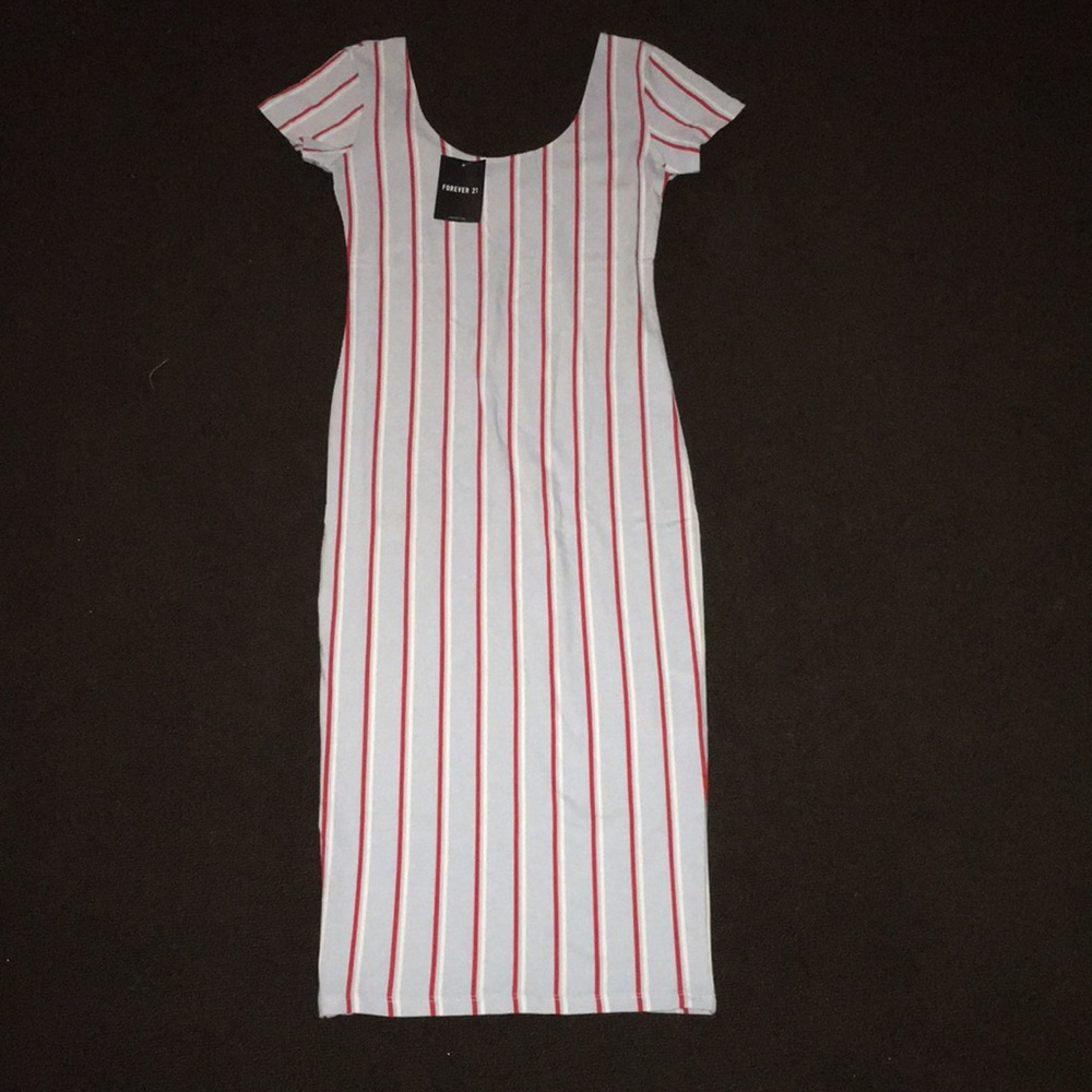 An off the shoulder striped light blue dress.